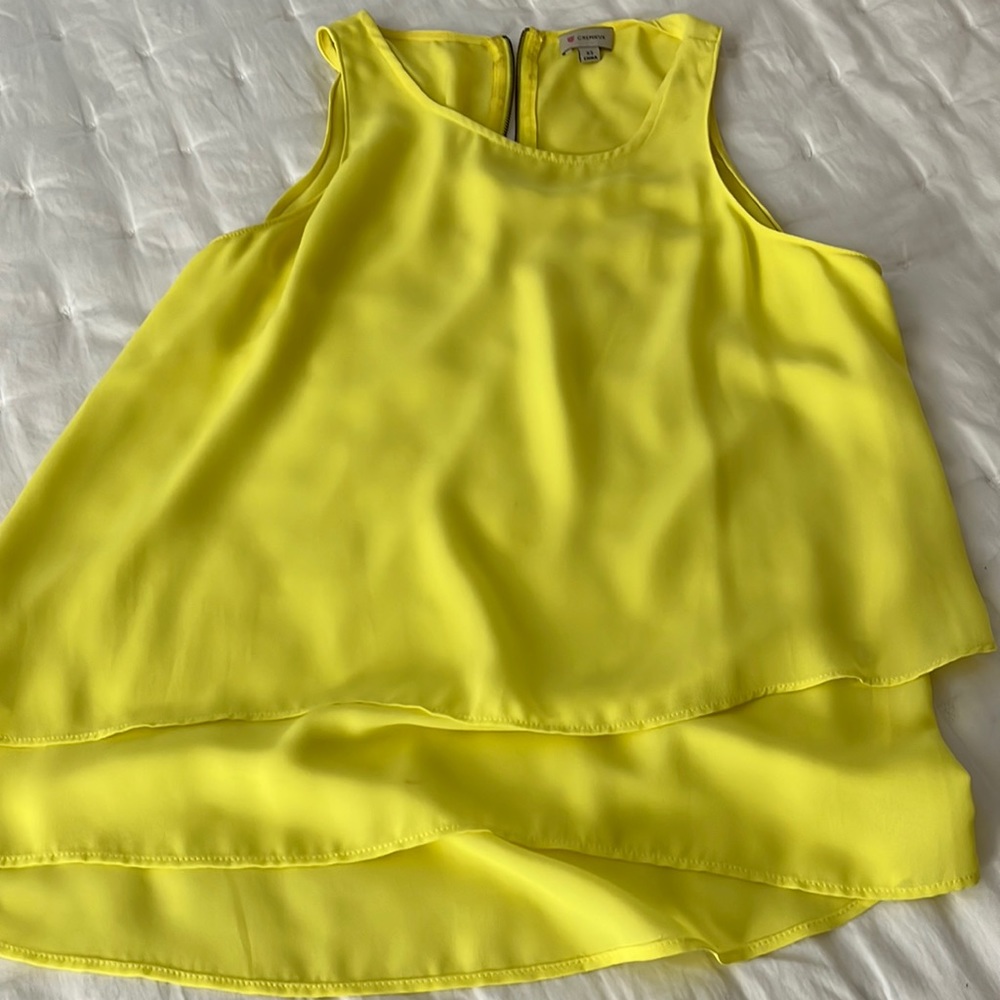 Yellow Cremieux sleeveless tapered shell blouse. 100% rayon